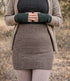DE COLORES nierwarmer alpaca BRUIN 27 ZWART REVERSIBLE
