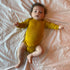ENGEL baby romper wol zijde met LANGE MOUW effen SAFFRAAN