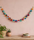 FAIRTRADE papieren slinger LOKTA DOTS eco papier met vilten balletjes
