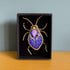 FAIRTRADE broche KEVER PAARS met pailetten en kralen