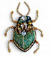 FAIRTRADE broche KEVER GROEN met pailetten en kralen