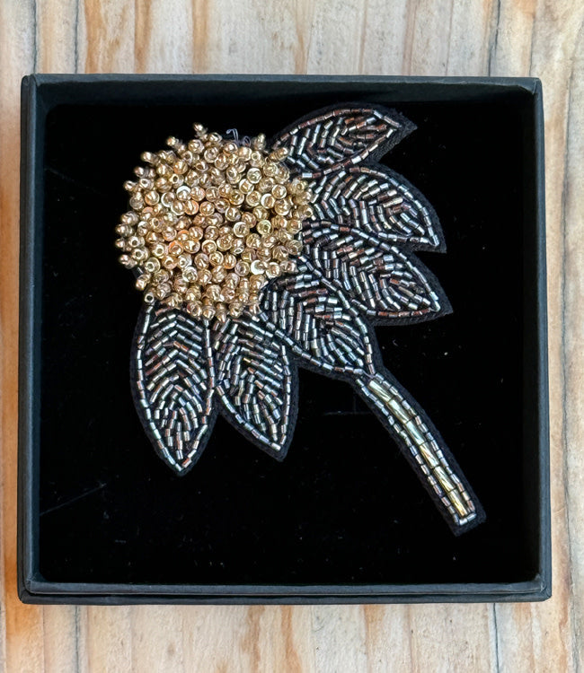 FAIRTRADE broche ZONNEHOED met pailetten en kralen