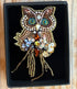 FAIRTRADE broche UIL met pailetten en kralen