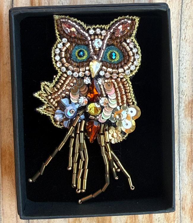 FAIRTRADE broche UIL met pailetten en kralen