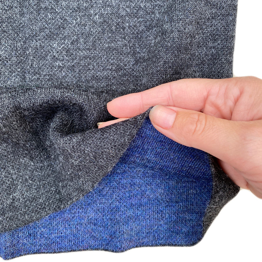 DE COLORES nierwarmer alpaca BLAUW ZWART 86 REVERSIBLE