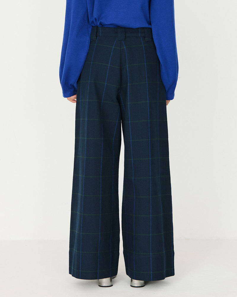 SKFK high-waisted NIA CHECKS wide-leg trousers in organic cotton